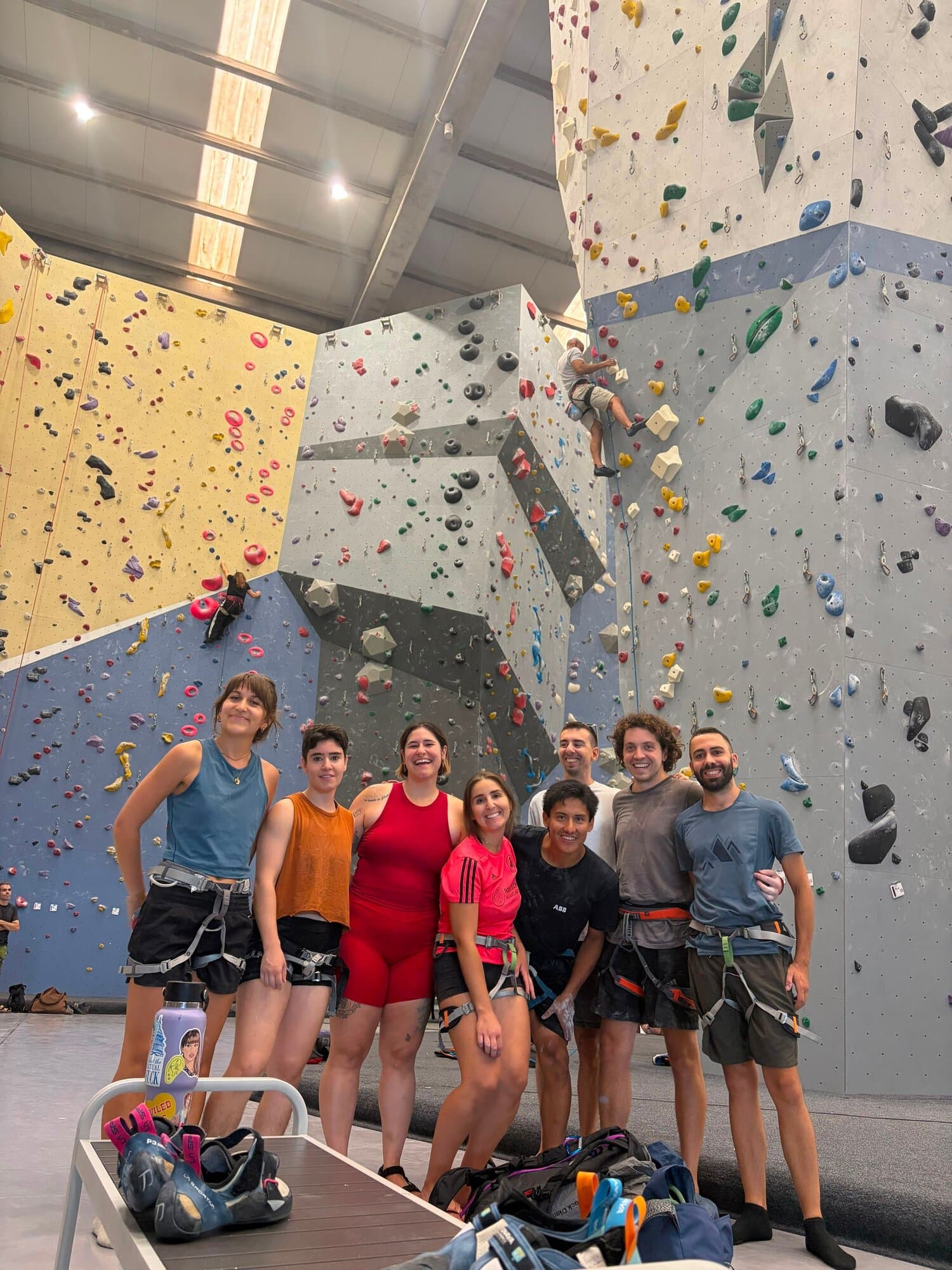 Keep Calm climbing group posing together at an indoor bouldering gym in Barcelona