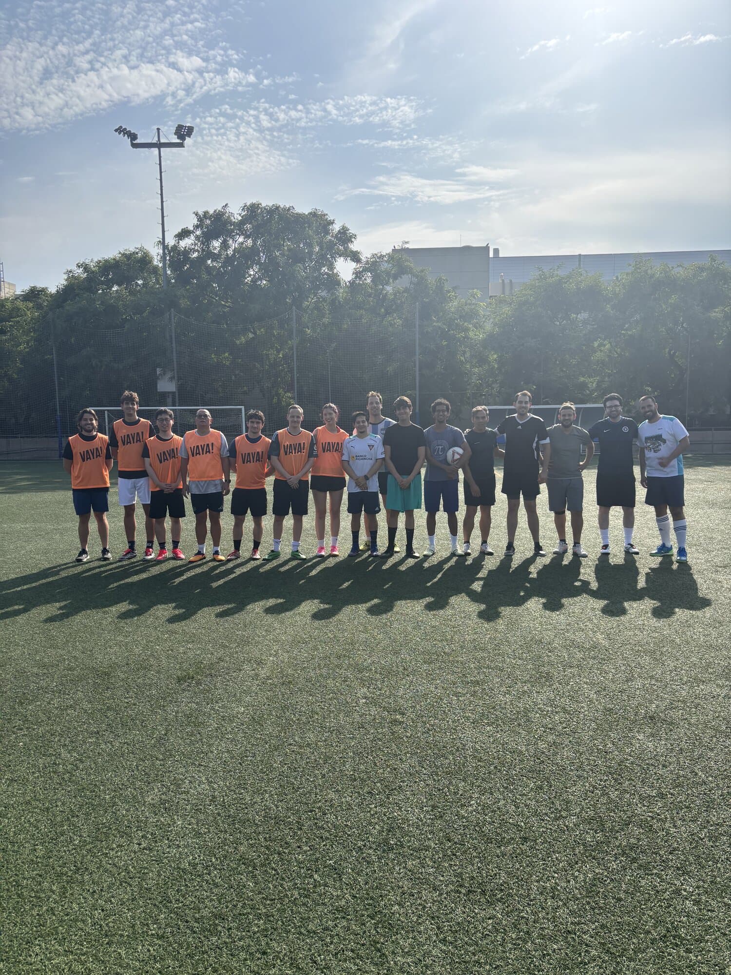 Keep Calm Community Friday football teams lined up on the Satalia pitch on Montjuïc, Barcelona