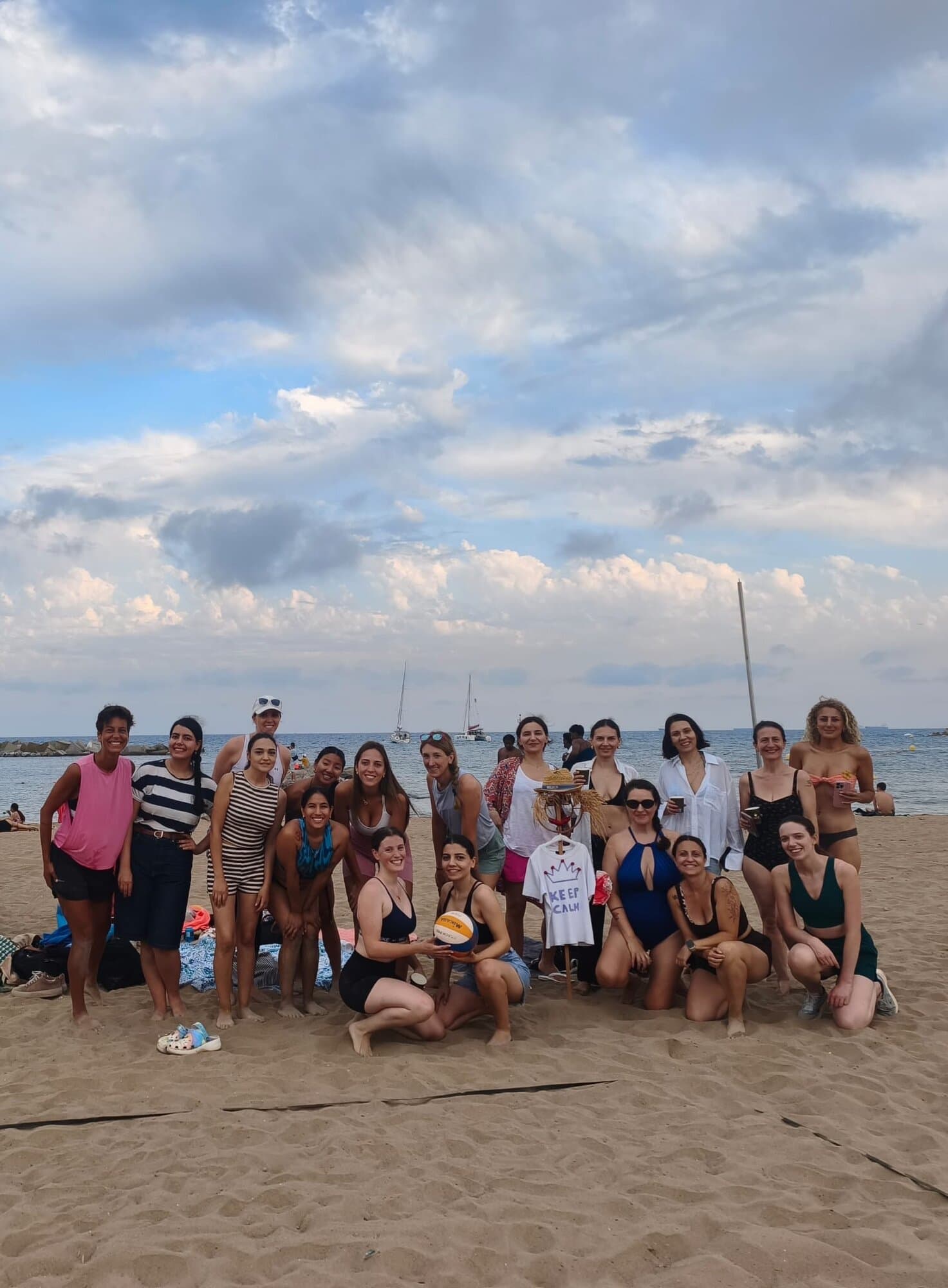 Keep Calm Women's Volleyball group at Somorrostro Beach, Barcelona