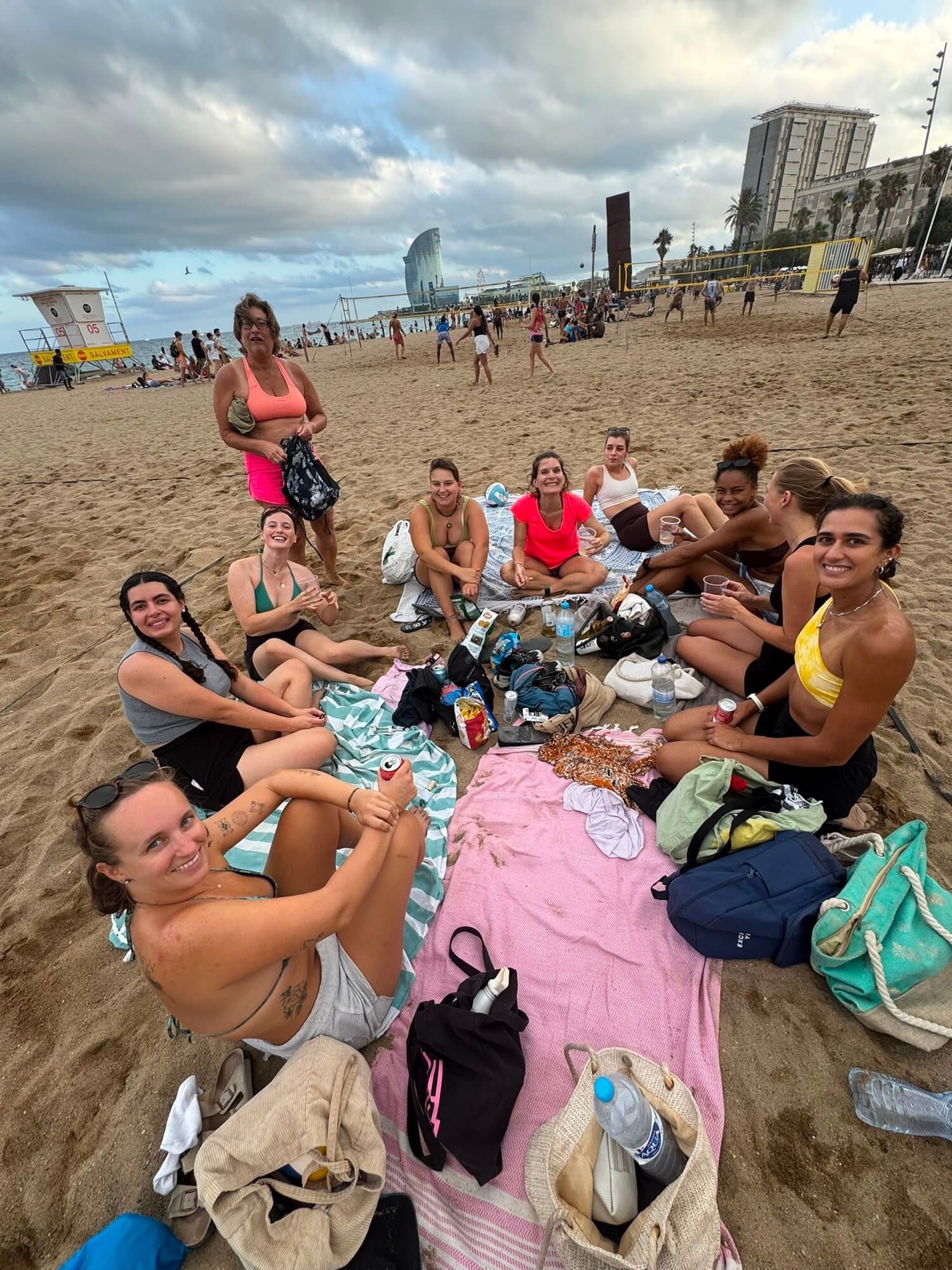 Keep Calm Women's Volleyball group picnic at Somorrostro Beach, Barcelona
